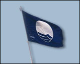 Bl flagg - En kvalitetsmrkning av stranden, dess milj och skerhet.
